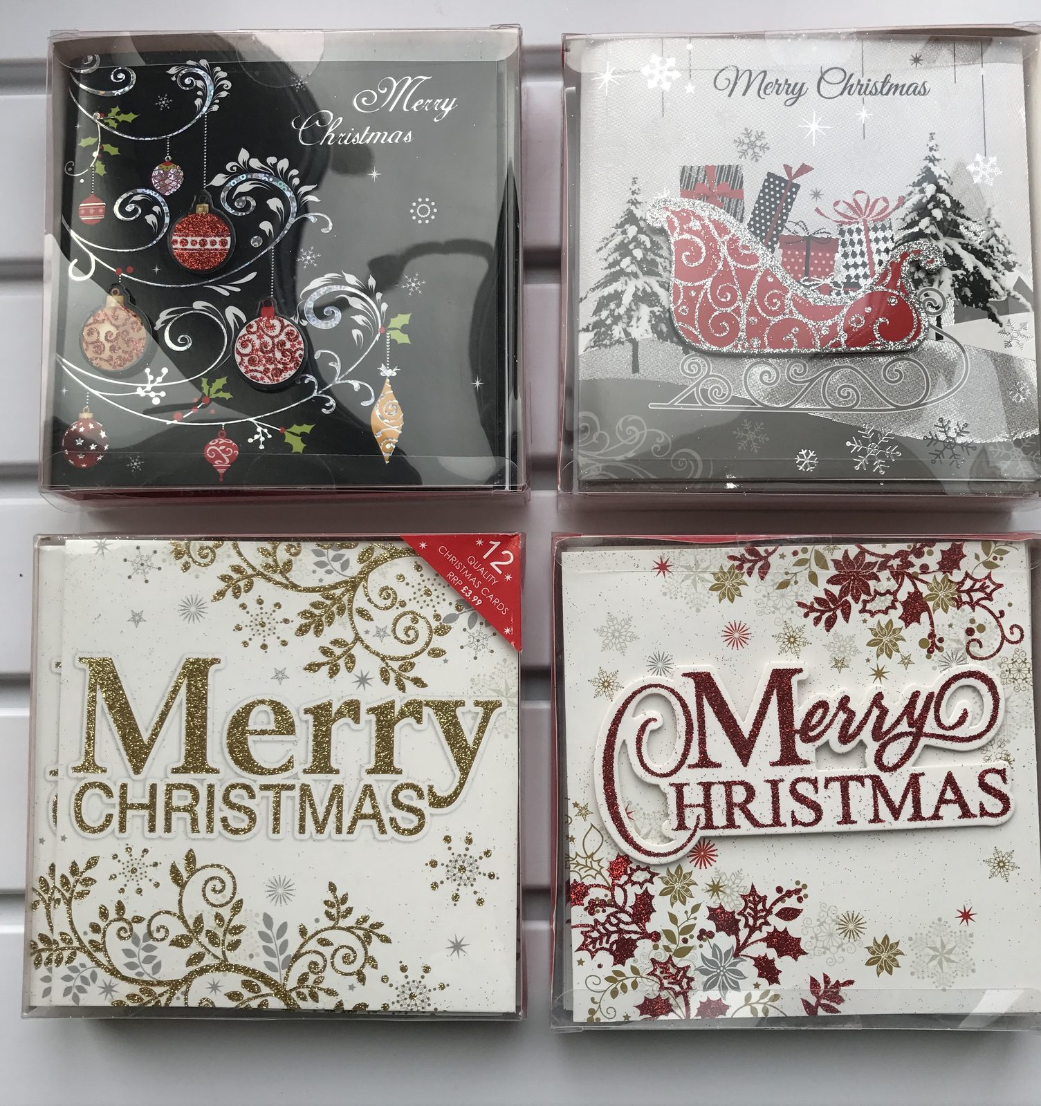 Christmas cards in an acetate box
