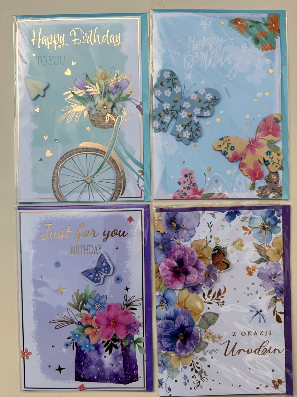 Handmade birthday cards with floral and butterfly designs